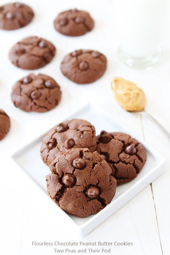 Flourless Chocolate Peanut Butter Cookies Recipe on twopeasandtheirpod.com. You will never know these rich and chocolaty cookies are made without flour. They are SO good! Chocolate Peanut Butter Cookies with no flour