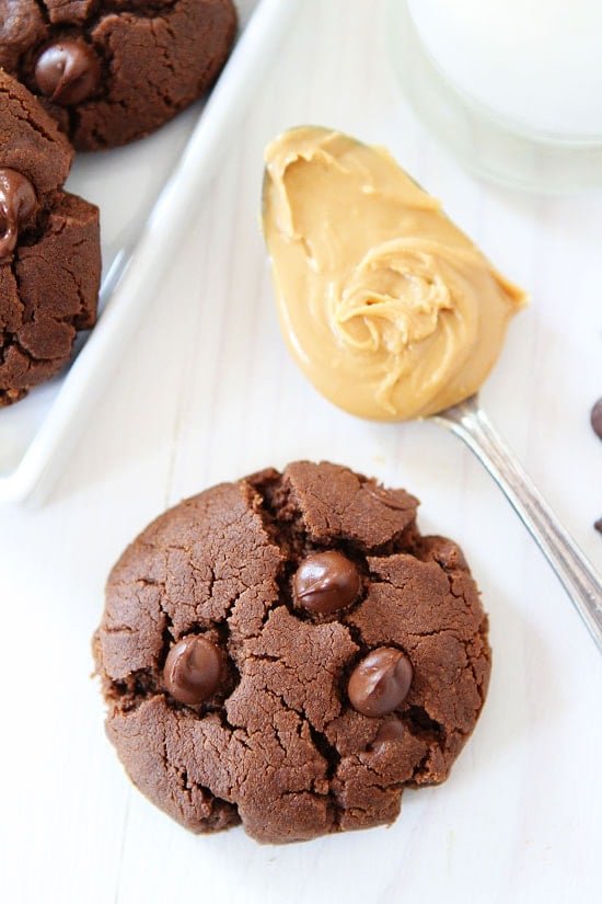 Flourless Chocolate Peanut Butter Cookies Recipe on twopeasandtheirpod.com. These gluten-free chocolate peanut butter cookies are divine! Gluten Free Chocolate Peanut Butter Cookies Recipe