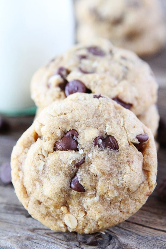 Whole Wheat Oatmeal Chocolate Chip Cookies on twopeasandtheirpod.com These cookies are made with whole wheat flour, coconut oil, and oats! We LOVE these healthy cookies! Whole Wheat Oatmeal Chocolate Chip Cookies