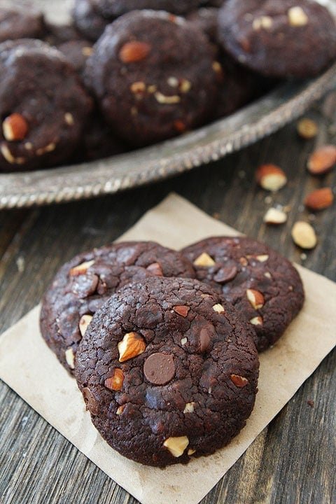 Vegan Chocolate Almond Cookies Recipe Vegan Chocolate Almond Cookies Recipe on twopeasandtheirpod.com Rich and fudgy chocolate cookies with almonds and chocolate chips! #vegan #chocolate