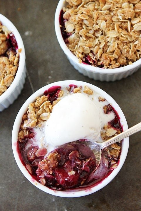 Rhubarb Berry Crisp Recipe Rhubarb Triple Berry Crisp topped with vanilla ice cream