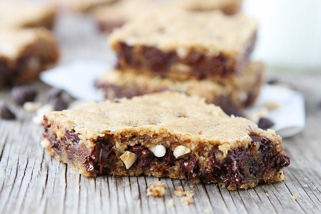 Brown Butter Chocolate Chip Hazelnut Cookie Bars Brown Butter Chocolate Chip Hazelnut Cookie Bar Recipe on twopeasandtheirpod.com #recipe