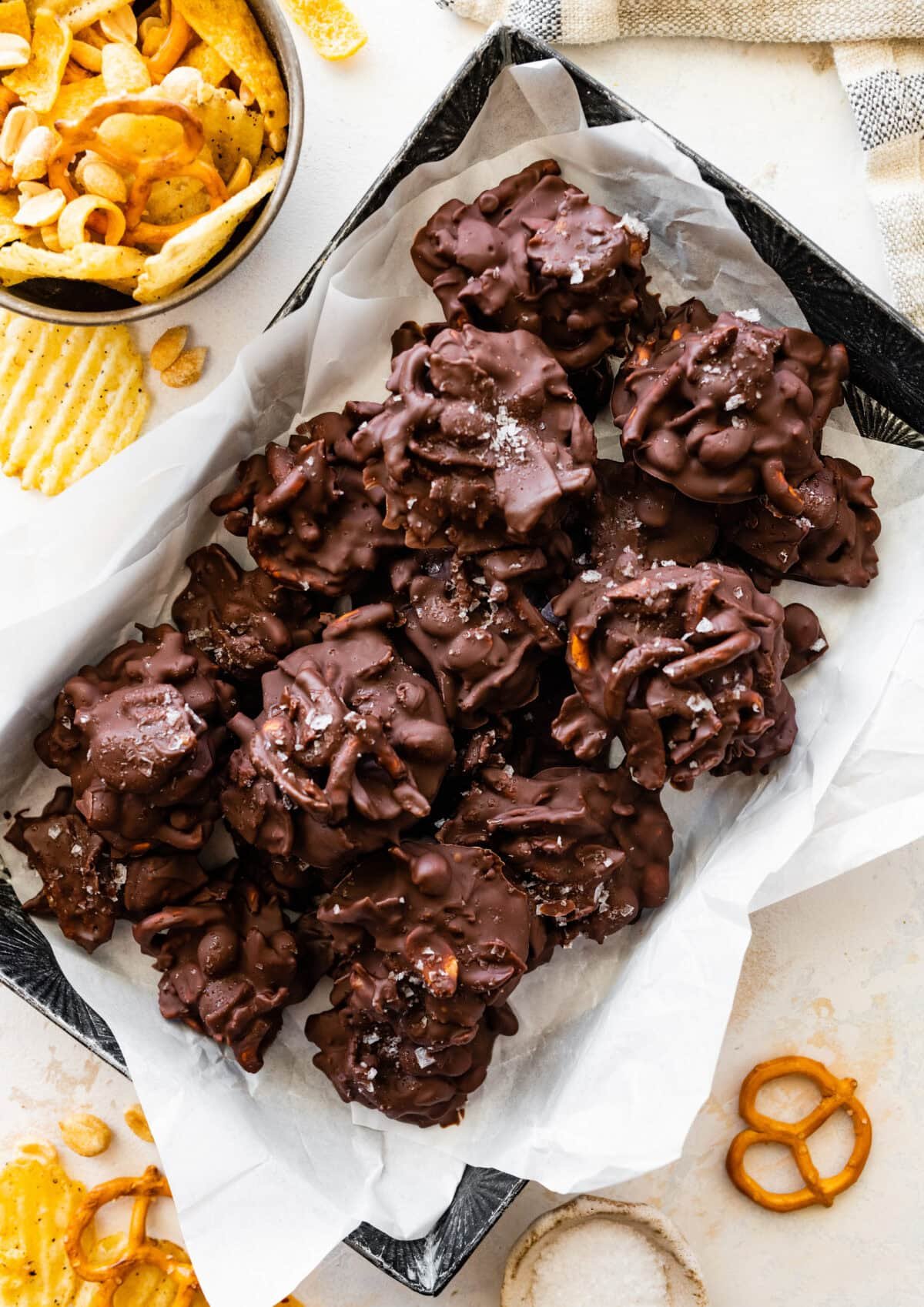 Trader Joe's copycat snacky clusters in pan with parchment paper.