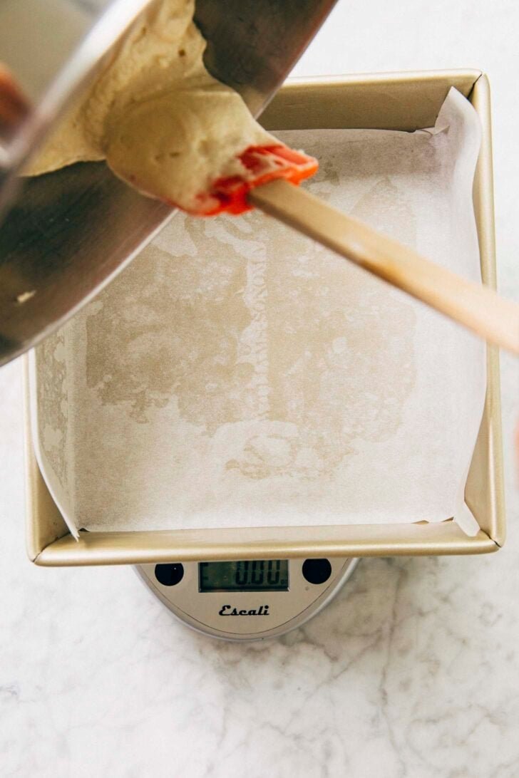 photo of Michelle from Hummingbird High weighing out the batter for each cake layer