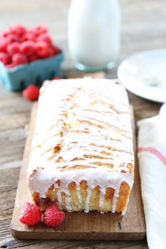 Coconut Raspberry Bread Recipe on twopeasandtheirpod.com This simple and sweet quick bread is great for breakfast, brunch, or dessert! Coconut Raspberry Bread Recipe