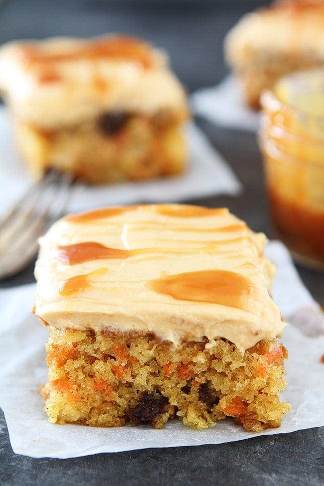 Easy Carrot Cake with Caramel Cream Cheese Frosting Recipe on twopeasandtheirpod.com This moist carrot cake is packed with carrots, pineapple, cinnamon, raisins and topped with a thick layer of caramel cream cheese frosting. It is the perfect Easter dessert! Easy Carrot Cake with Caramel Cream Cheese Frosting Recipe