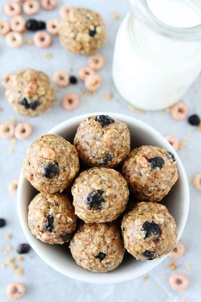No Bake Berry Energy Bites Recipe on twopeasandtheirpod.com These easy energy bites only take 10 minutes to make! They are great for breakfast on the go or snack time! No Bake Berry Energy Bites Recipe