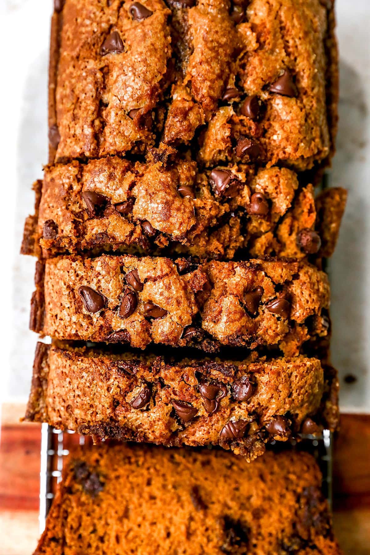 pumpkin chocolate chip bread cut in slices.