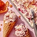 No churn ice cream with waffle cones next to the container.