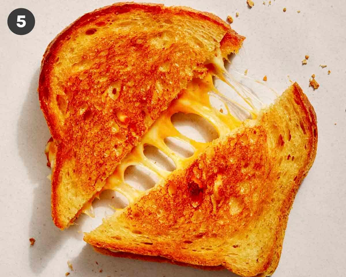Grilled cheese cut in half.