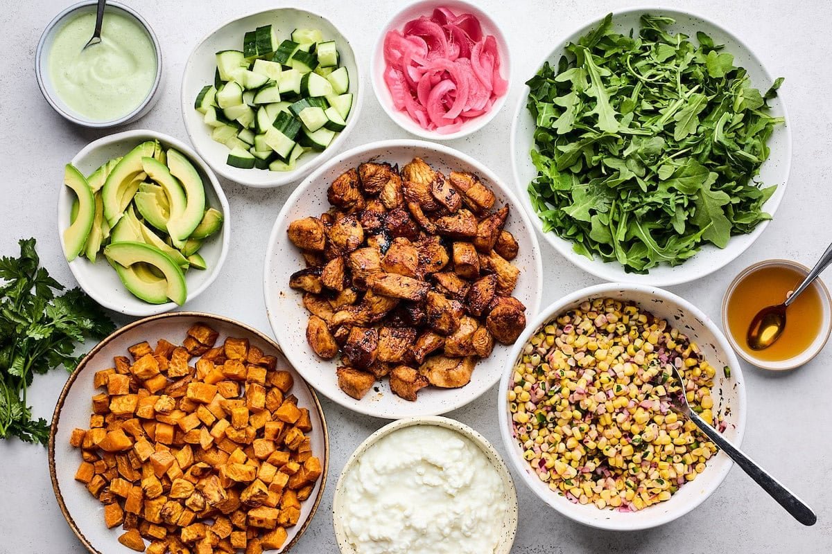 ingredients in bowls to make hot honey chicken bowls. 