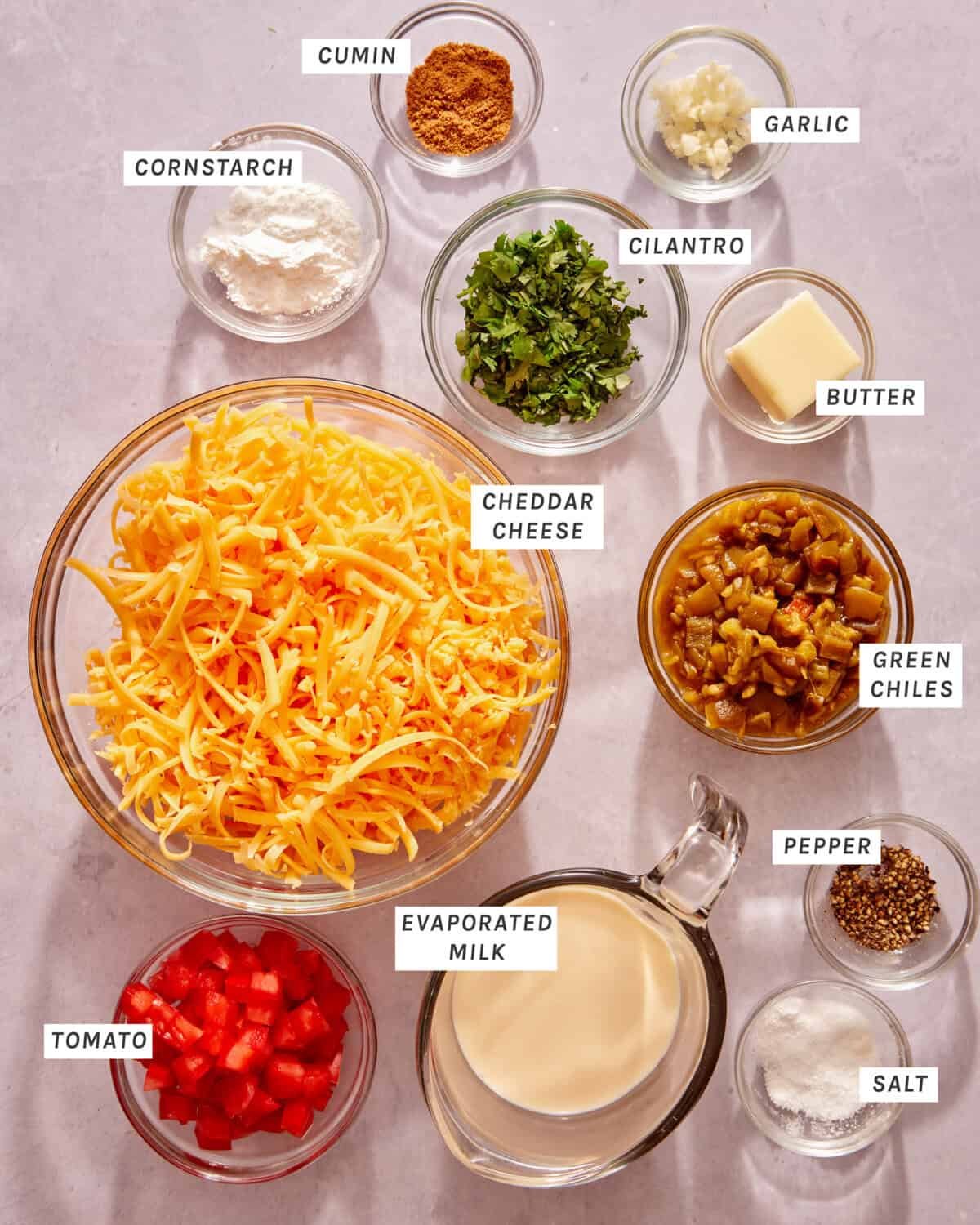 Ingredients for queso dip on a kitchen counter.