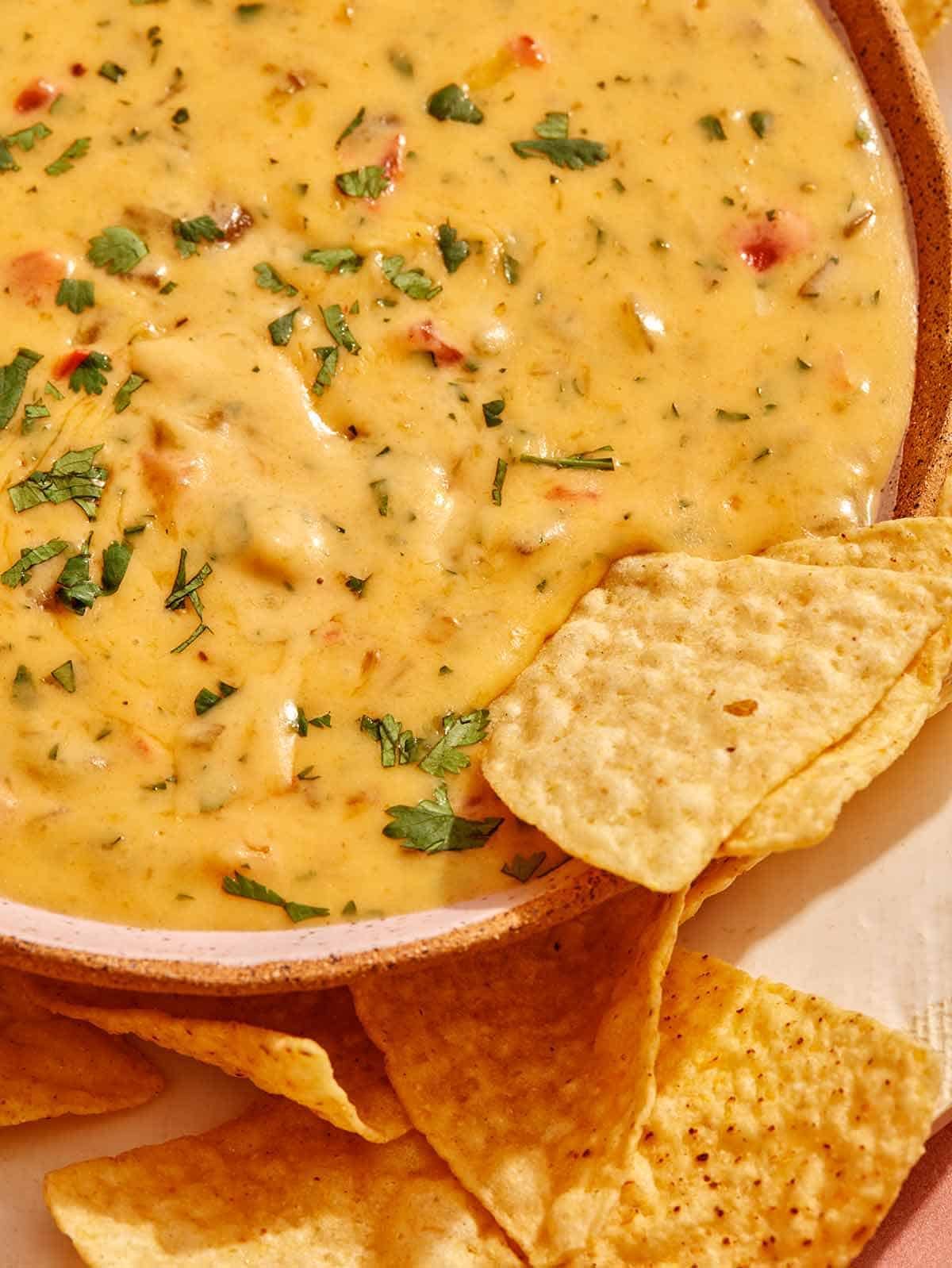 Queso dip with chips in it.