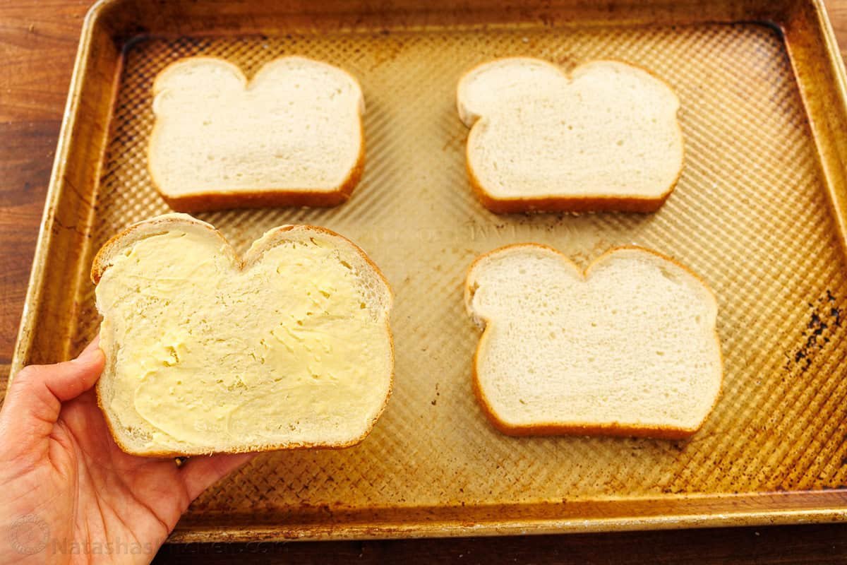 how to butter bread and line up on a baking sheet