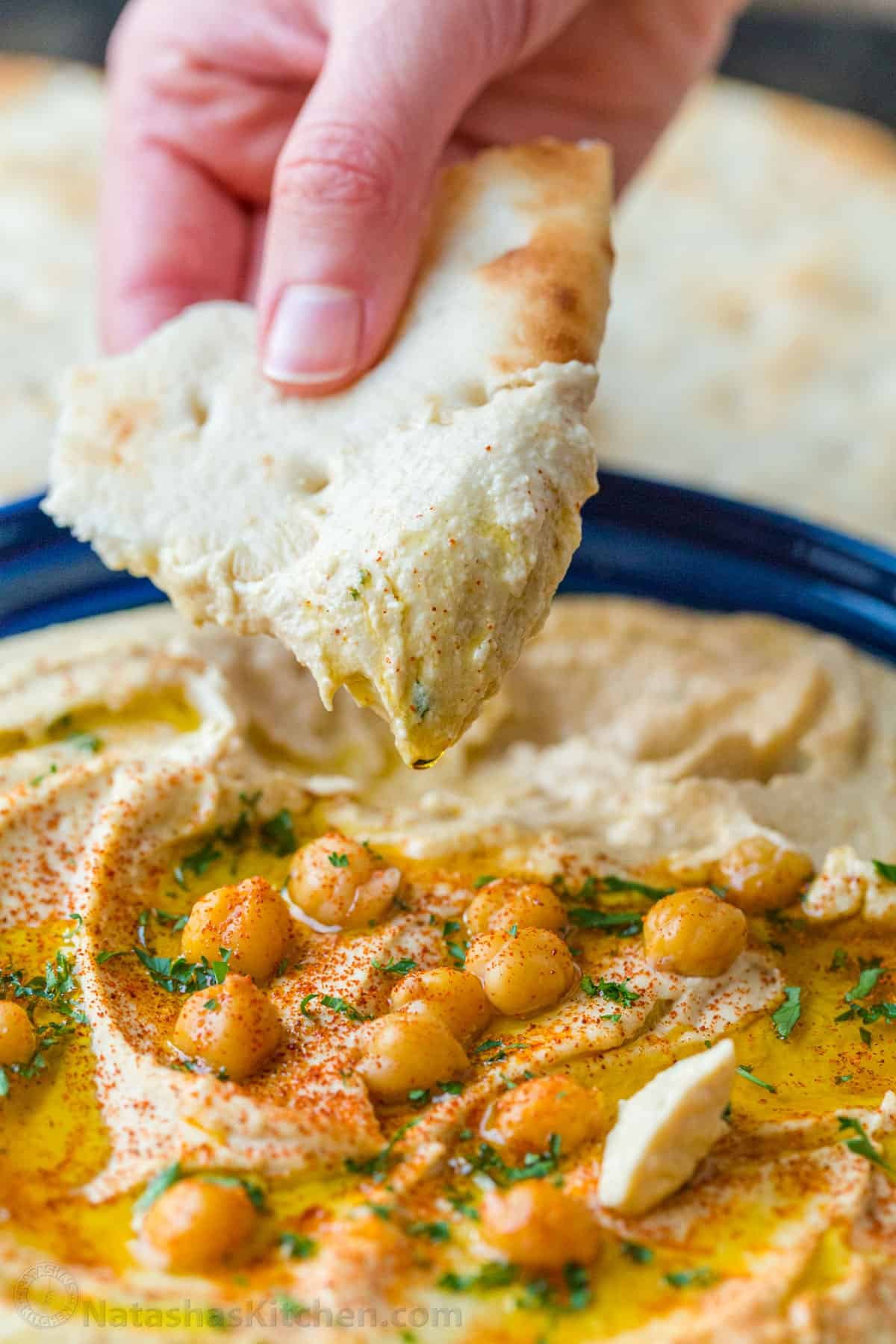 Creamy homemade hummus served with pita bread