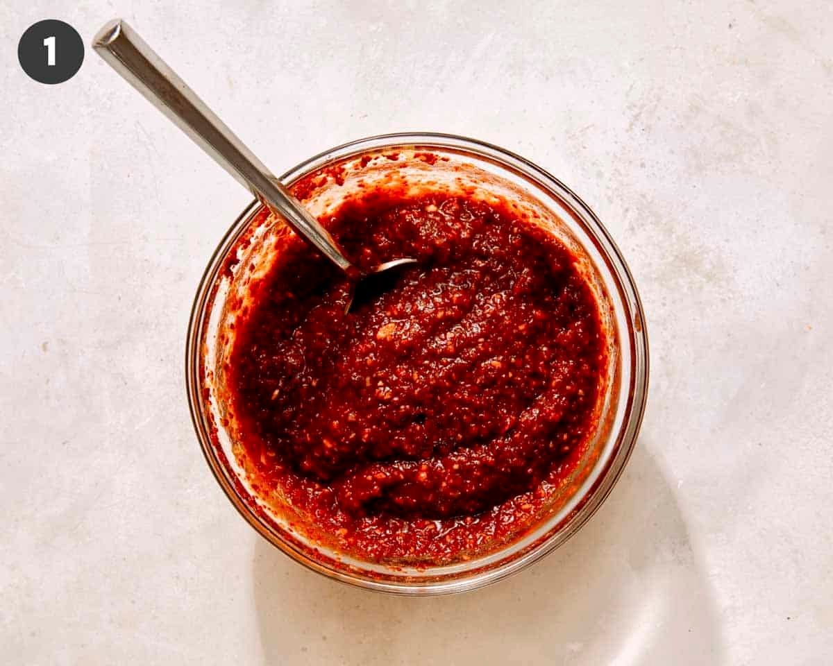 Korean army stew sauce mixed together in a bowl. 