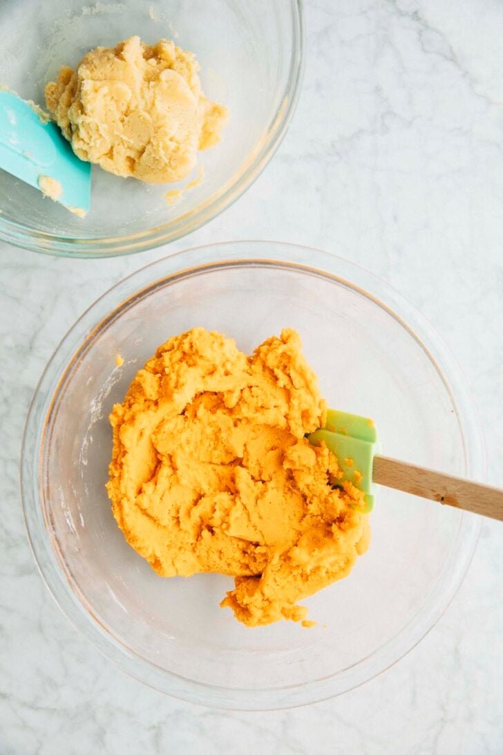 photo of Thai Tea cookie dough in a medium bowl and Sweetened Condensed Milk cookie dough in a small bowl