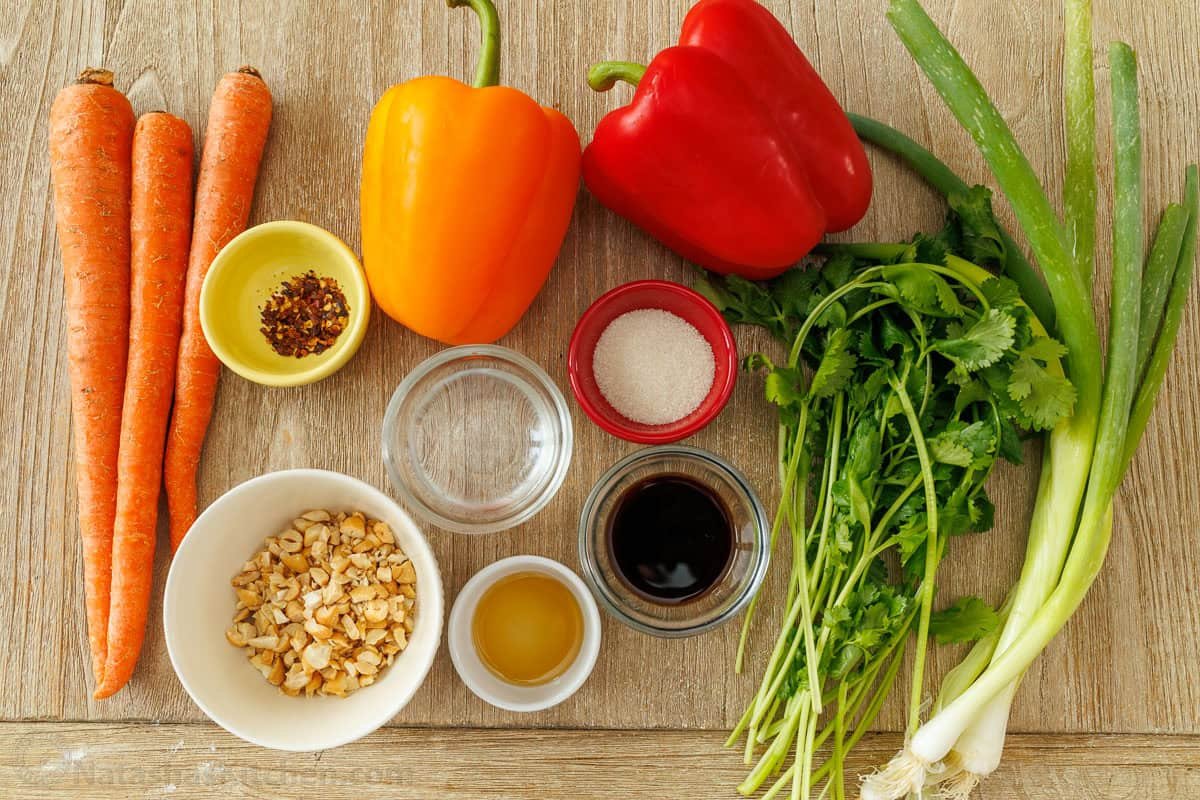Spicy Korean Carrot Salad packs so much flavor into one crowd-pleasing side dish. The easy dressing melds the whole salad together in minutes. vegetable and spices for making side dish