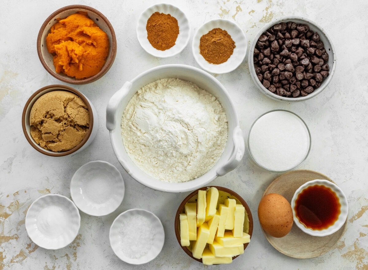 ingredients in bowls to make pumpkin chocolate chip skillet cookie.