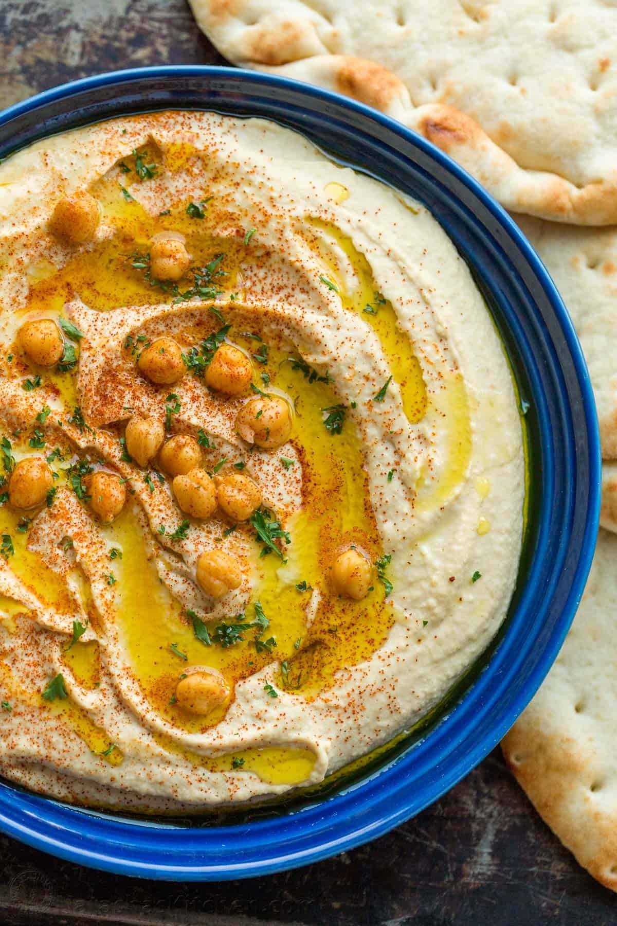 The Best Hummus recipe served in blue bowl 