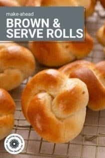 Baked bow knot dinner rolls on a wire rack. Text overlay includes recipe name.