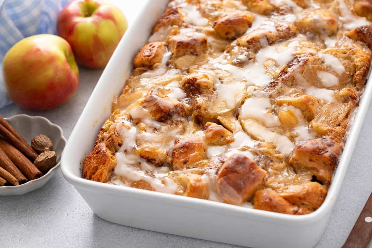 White baking dish filled with cinnamon roll casserole.