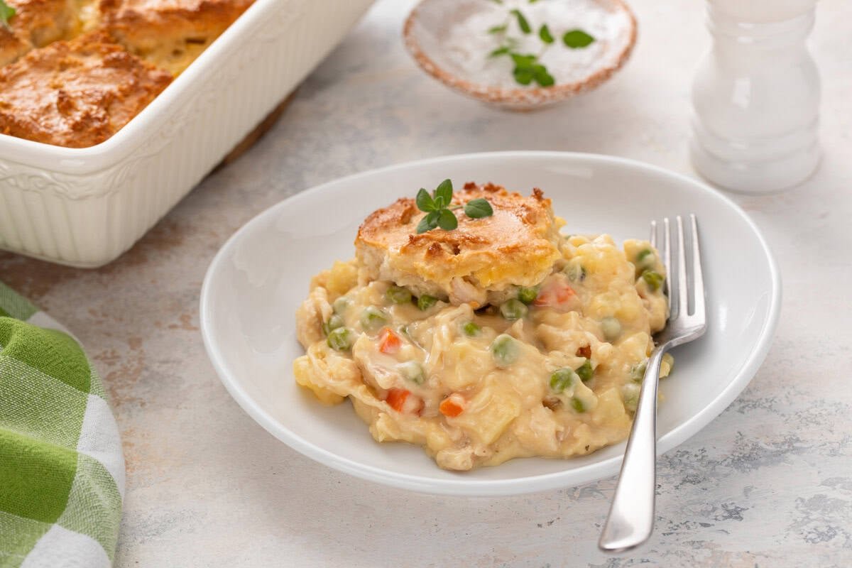 White plate holding a serving of bisquick chicken pot pie.