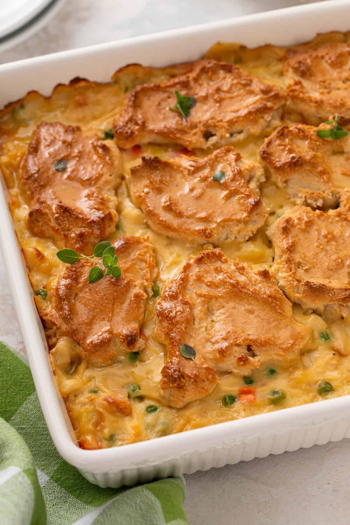 Baked bisquick chicken pot pie in a white baking dish.