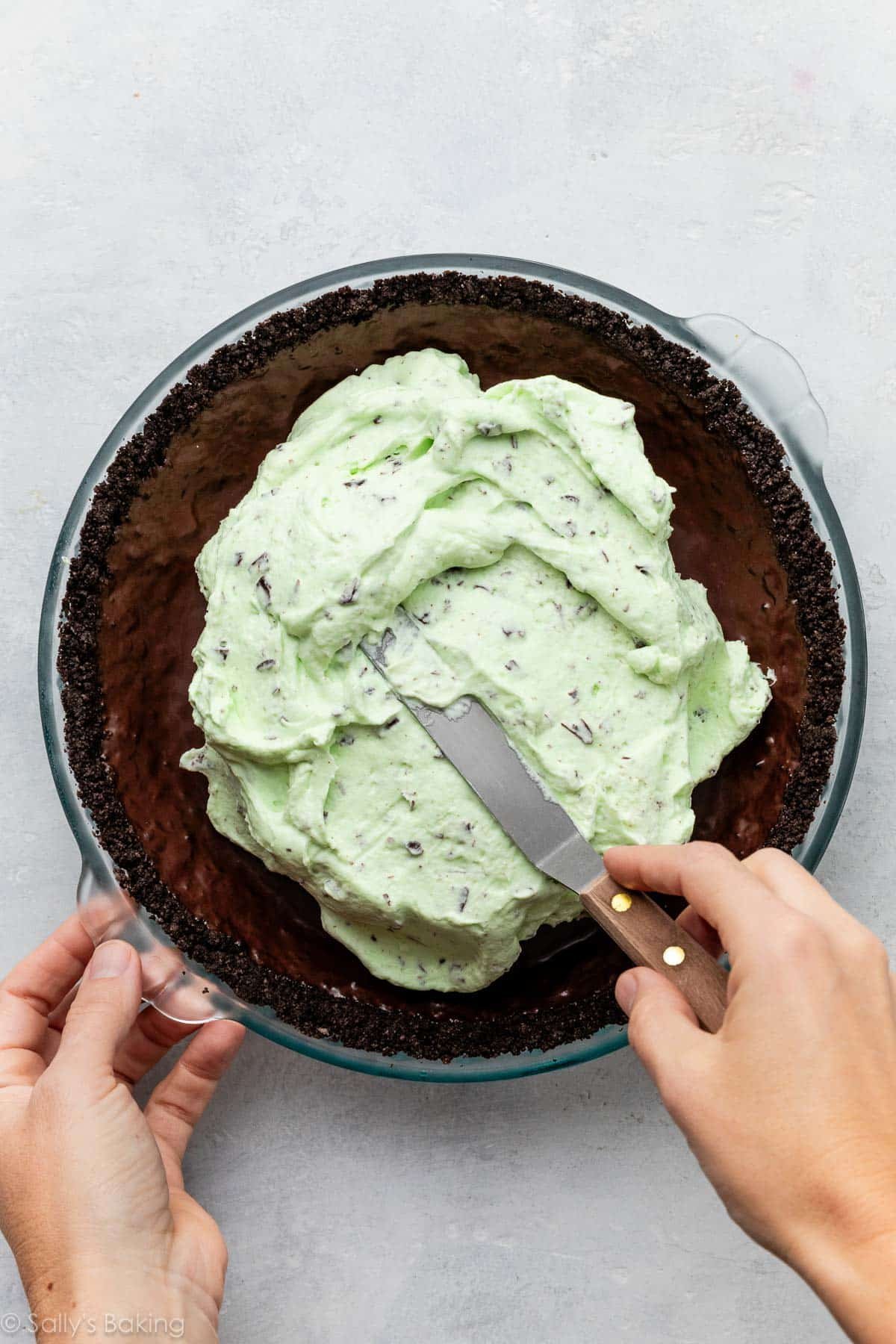 spreading filling into crust.