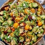 Shaved brussel sprout salad recipe in a bowl.