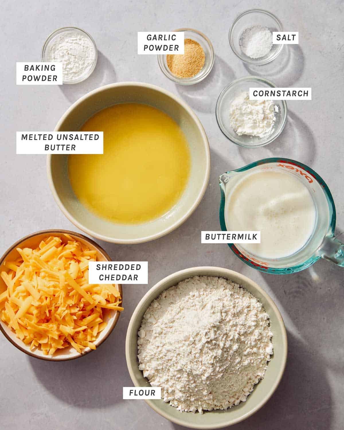 Ingredients for cheddar bay biscuits in bowls. 