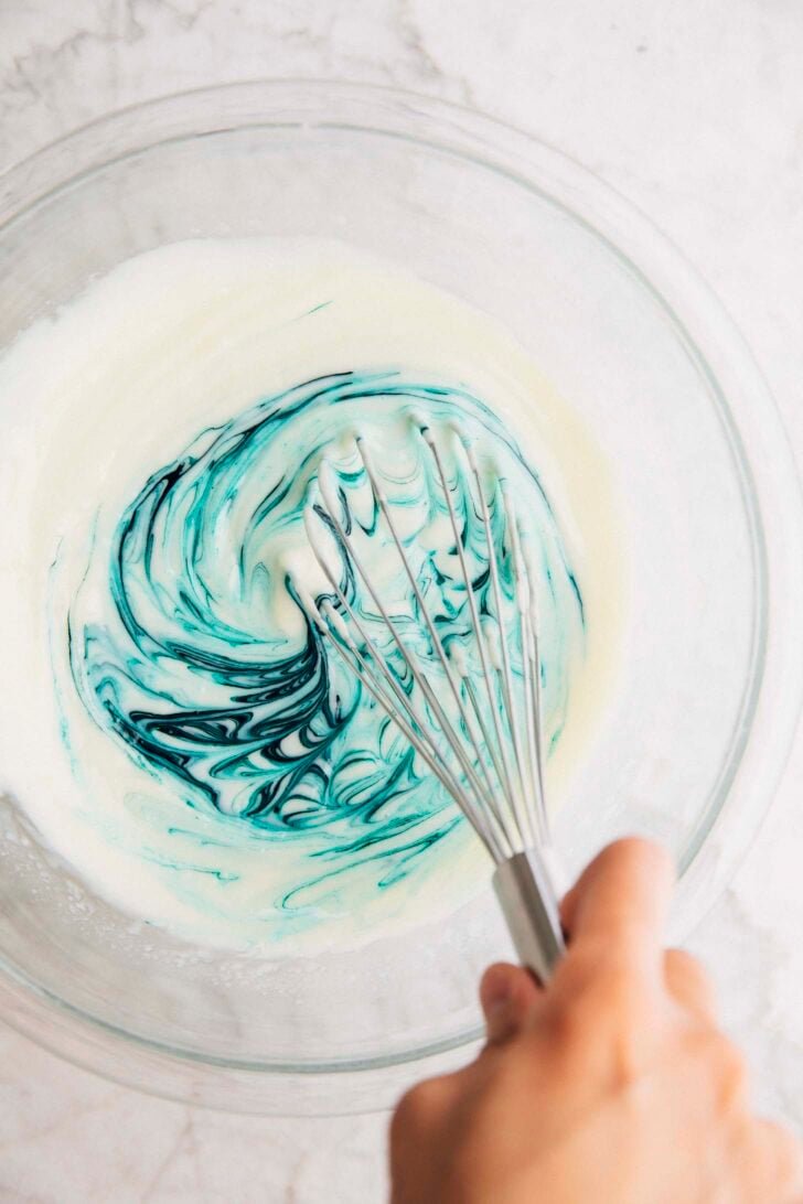 photo of Michelle from Hummingbird High mixing food coloring into the filling