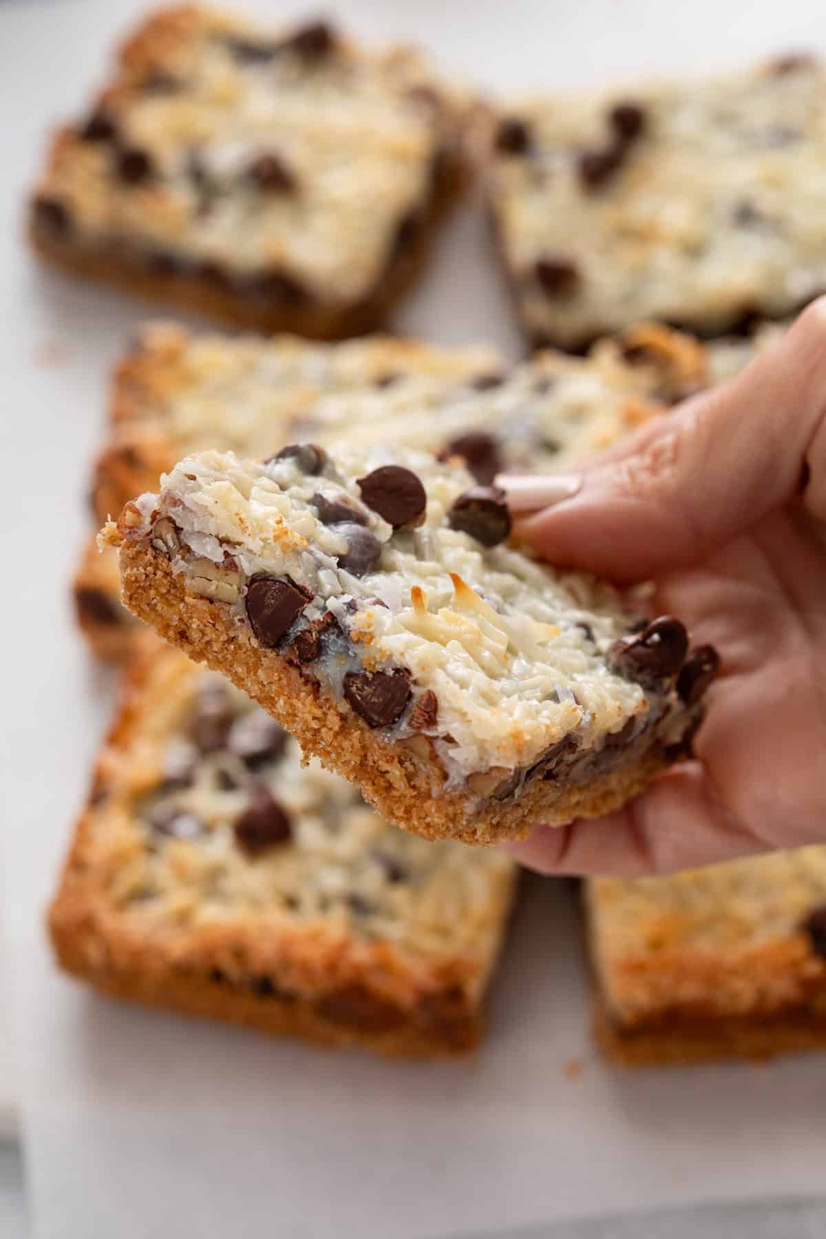 Hand holding a magic bar up to the camera.