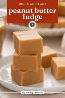 Three pieces of peanut butter fudge stacked on a white plate. Text overlay includes recipe name.