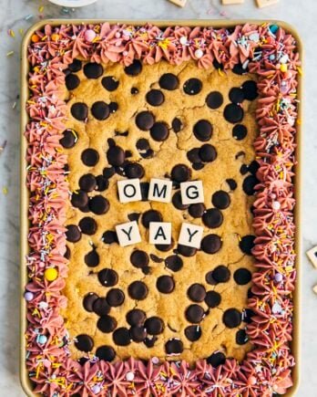 photo of rectangular cookie cake frosted and decorated with "OMG YAY"