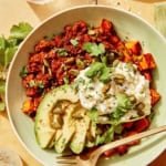 Beef protein bowl up close with a fork in the bowl.