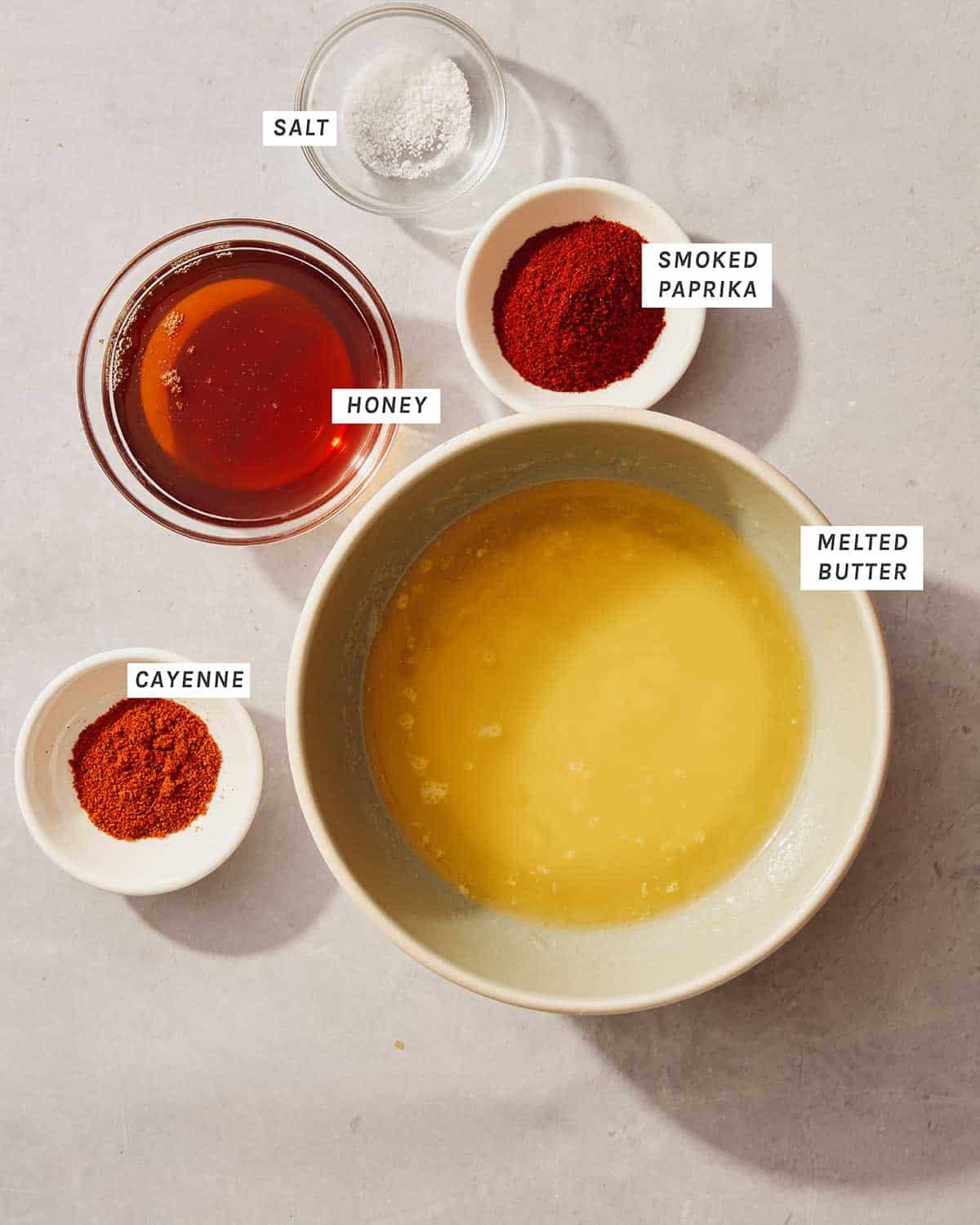 Ingredients for a hot honey butter drizzle for mozzarella sticks.