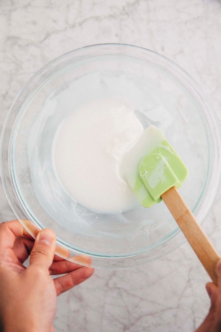 Photo showing lemon glaze in a clear bowl