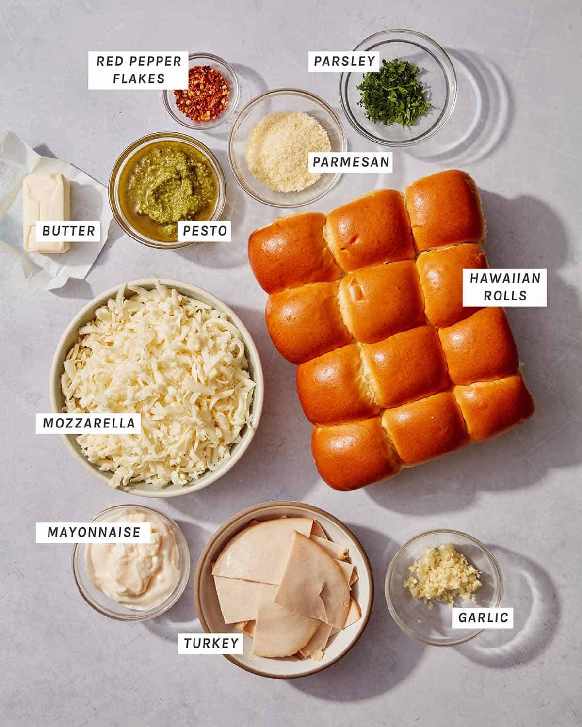 Ingredients to make Hawaiian roll sliders with turkey and pesto. 