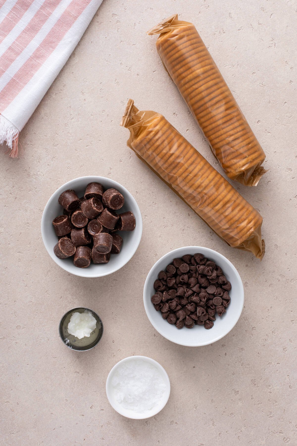 Ingredients for rolo ritz cracker cookies arranged on a countertop.