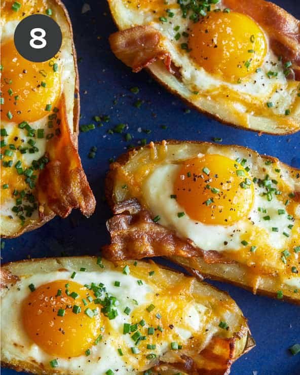 Twice baked breakfast potatoes on a blue plate.
