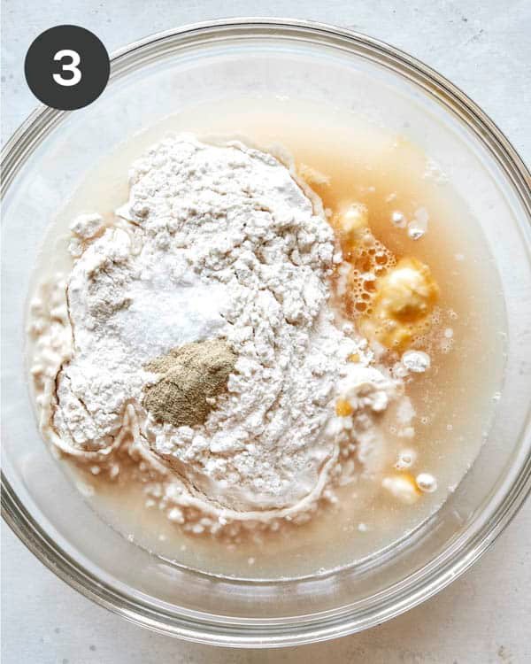 Whisking together wet ingredients to make okonomiyaki.