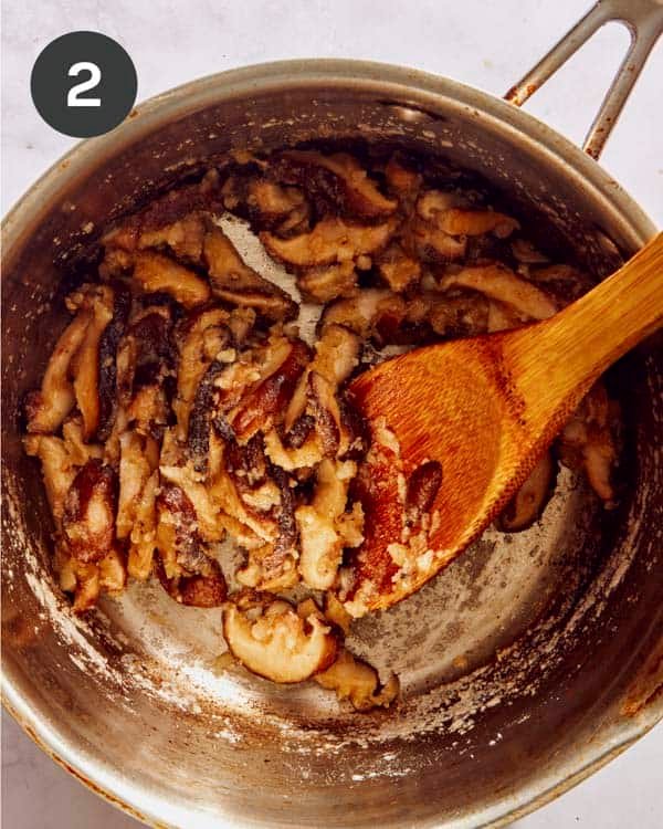 Mushroom gravy with flour in a pot.