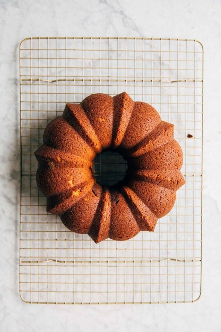 photo of the vietnamese coffee bundt cake on a wire rack just after it's been turned out of the pan