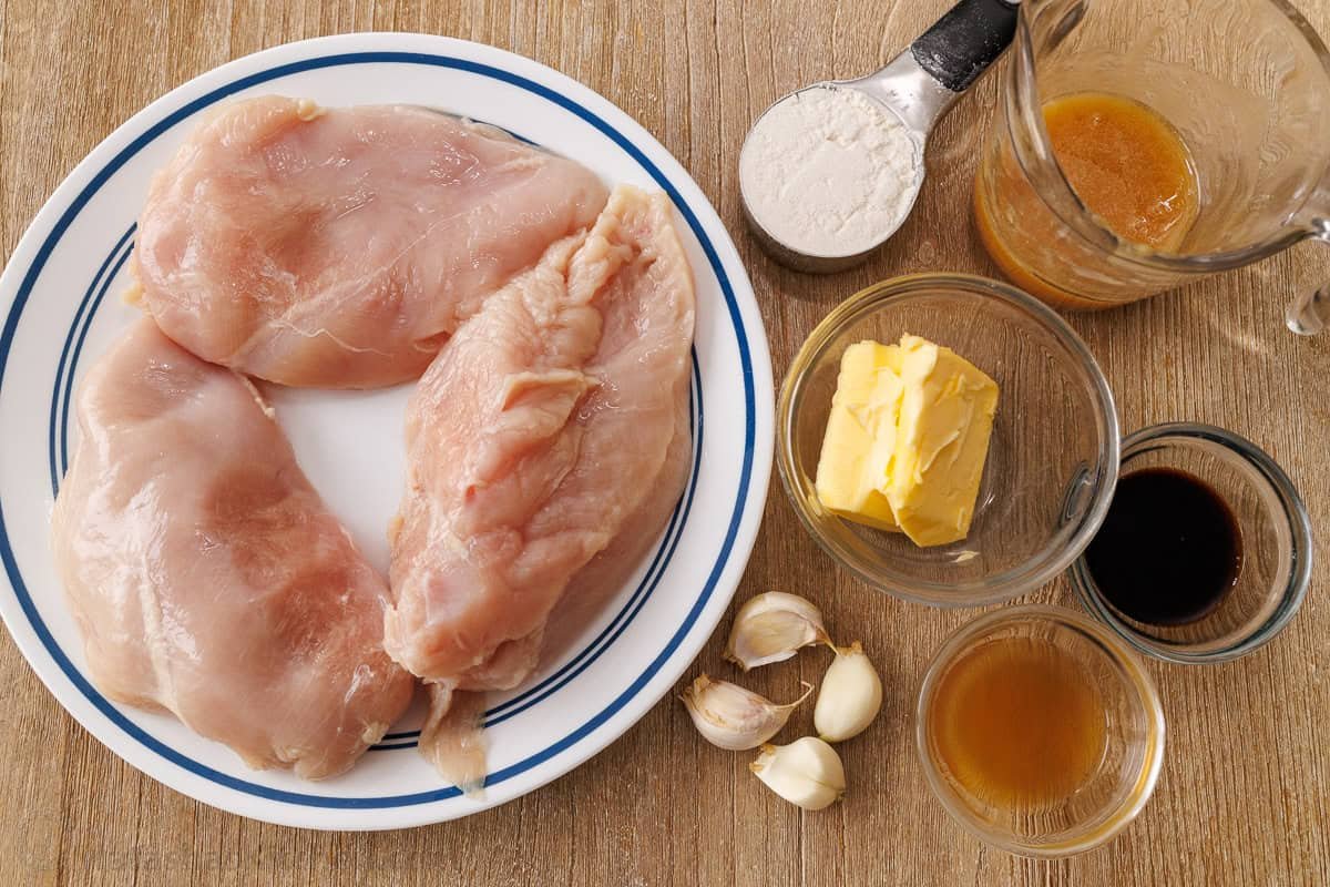easy poultry marinade recipe with meat, flour, butter, garlic, apple cider vinegar, soy sauce, and honey