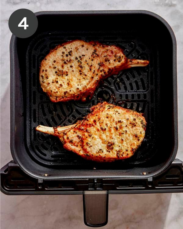 Air fryer pork chops freshly cooked.