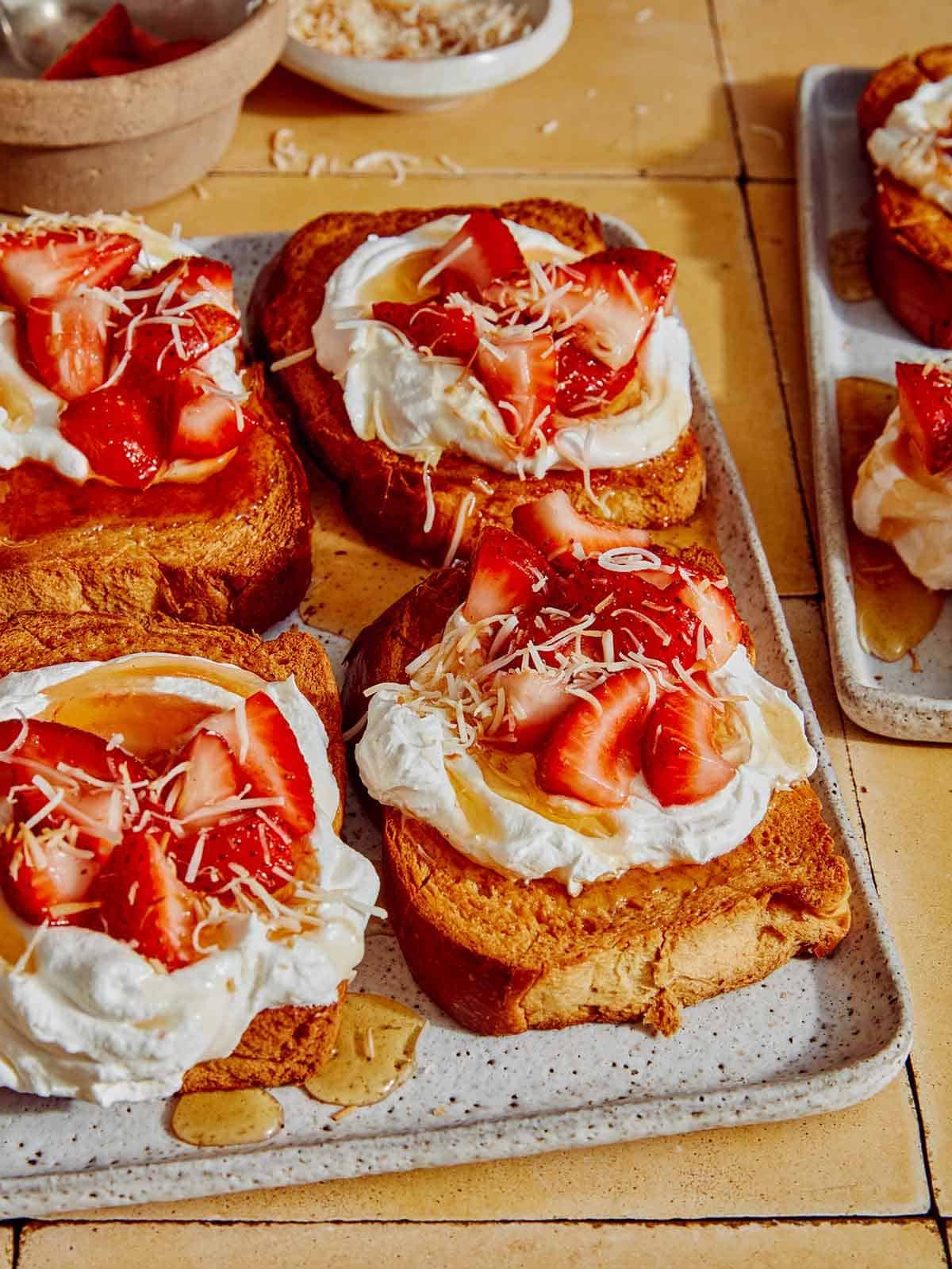 Honey toast with various toppings on a platter. 