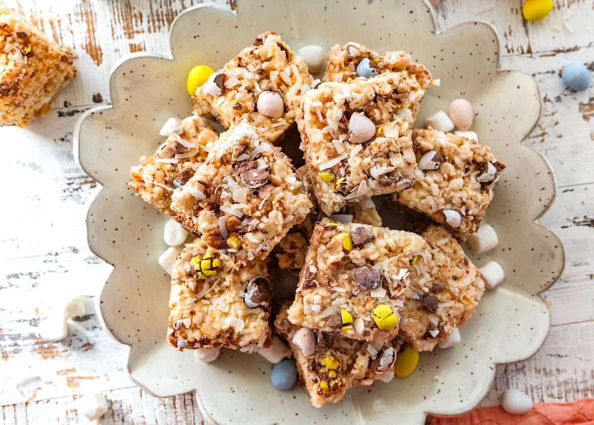 Cadbury egg rice krispie treats on flower plate. 