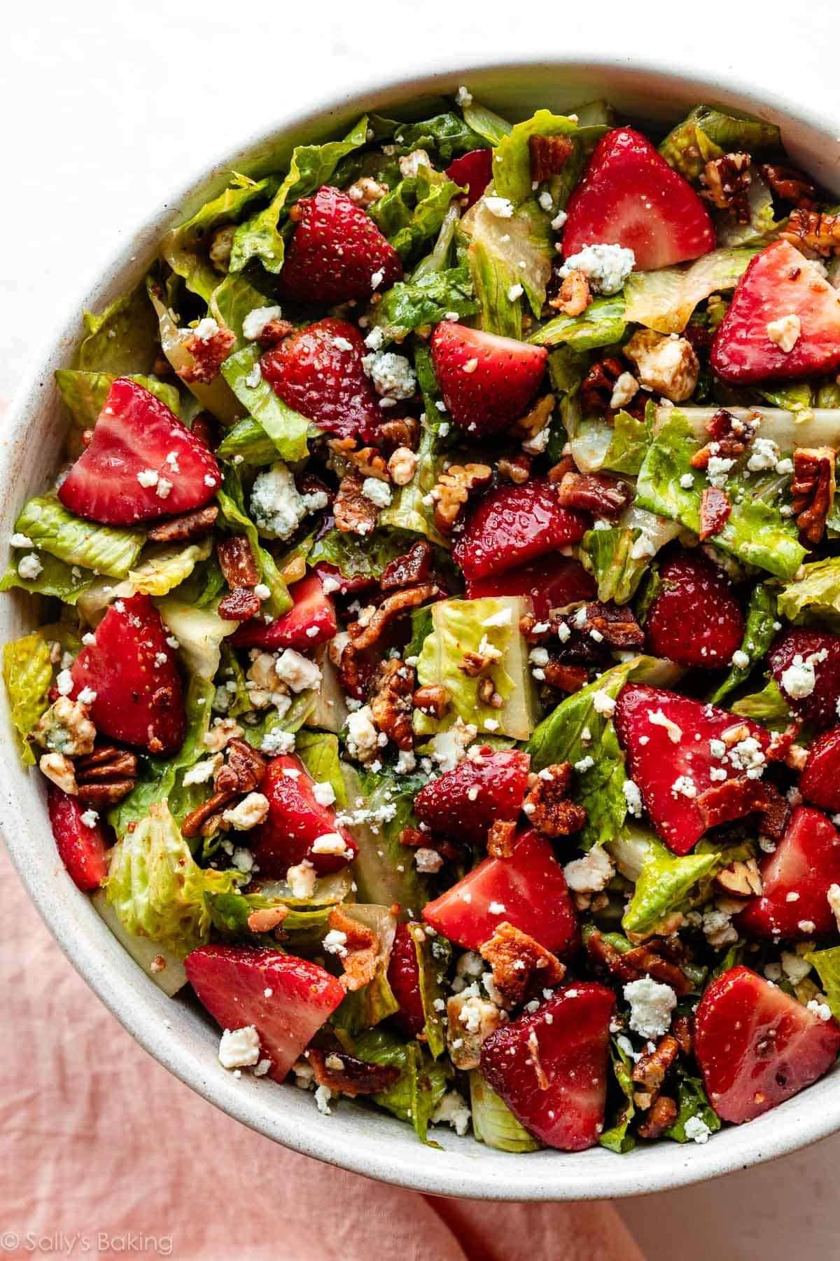 strawberry bacon salad with blue cheese and pecans.