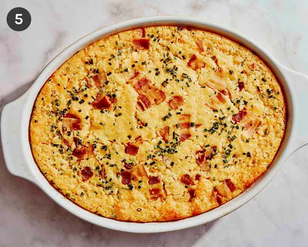 Freshly baked corn casserole in a baking dish.